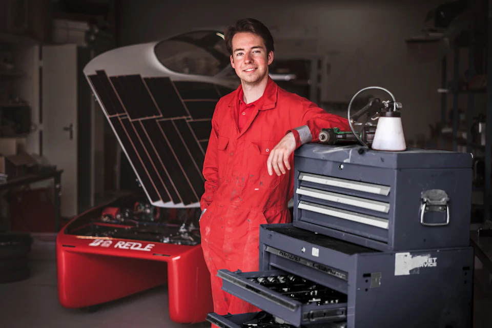 Friendly auto mechanic in a Toronto repair shop